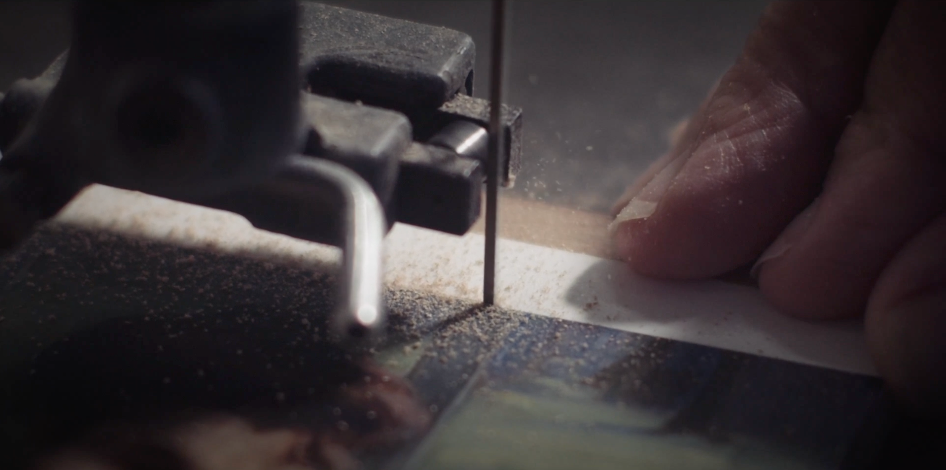 Load video: An Elms artisan hand cuts and finishes a wooden jigsaw puzzle