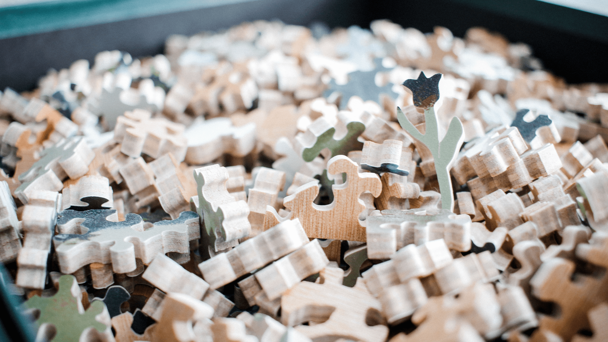 Handcrafted wooden jigsaw puzzle pieces